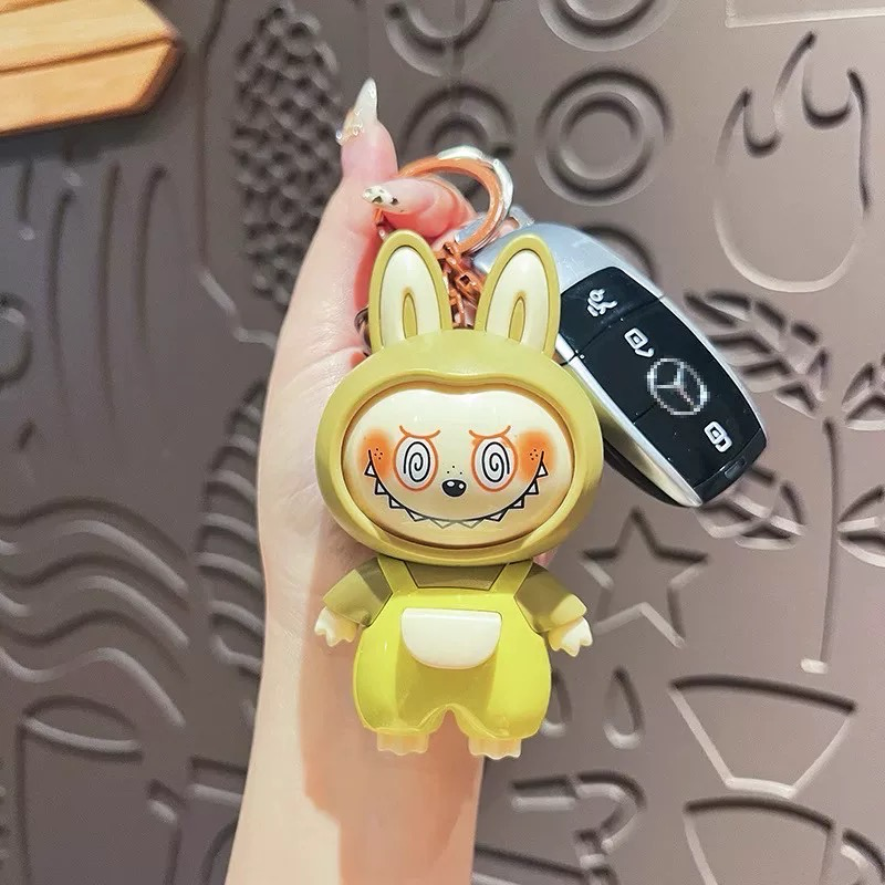 Changing Face Keychain Doll – Funny Stress Relief Toy & Fashion Pendant 5053426301