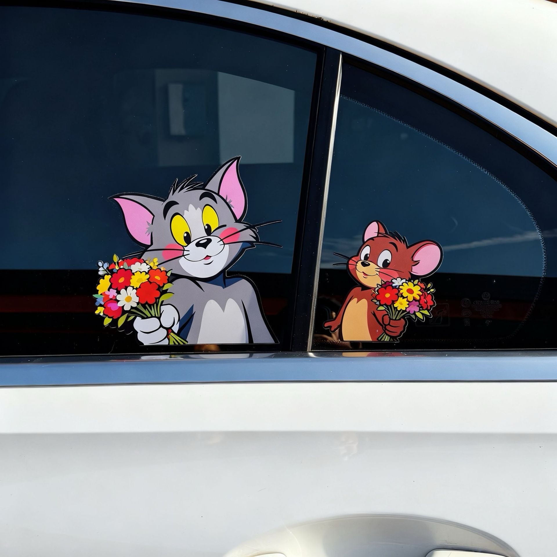 High-definition Tom and Jerry 3D car window stickers with flowers on a white vehicle.