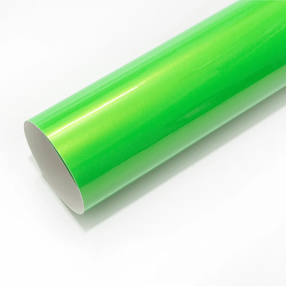 Roll of green vinyl wrap on a white background