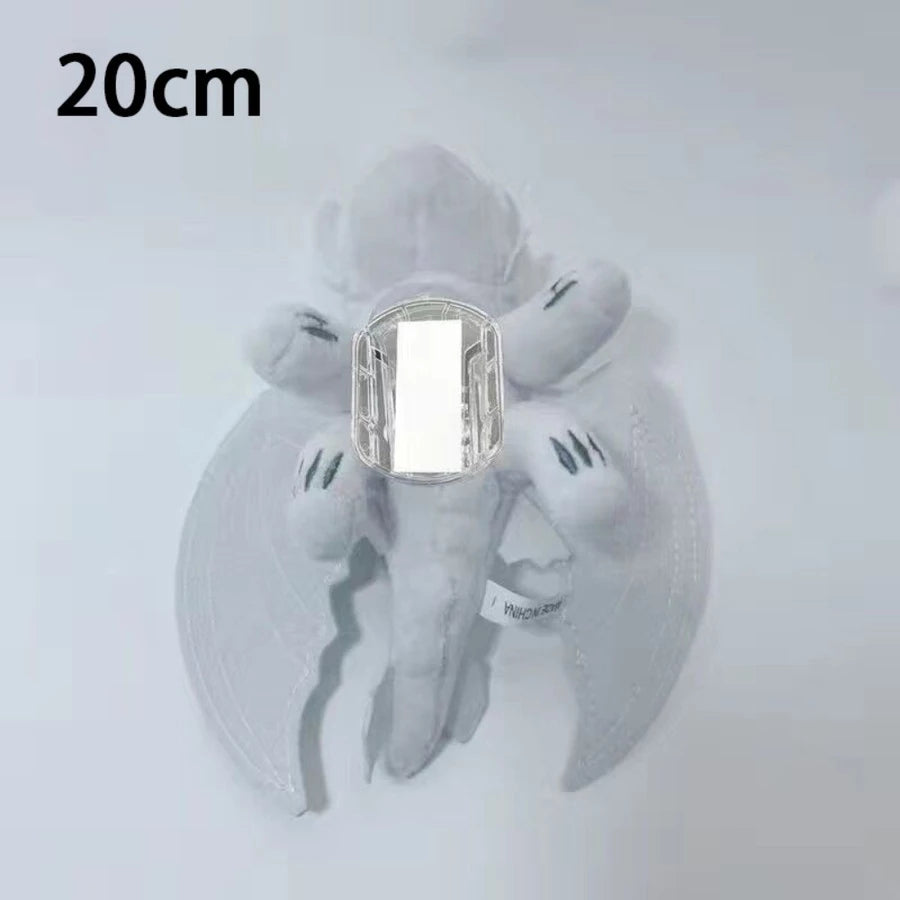 Plush toy with a silver ring on a white background, labeled '20cm'.