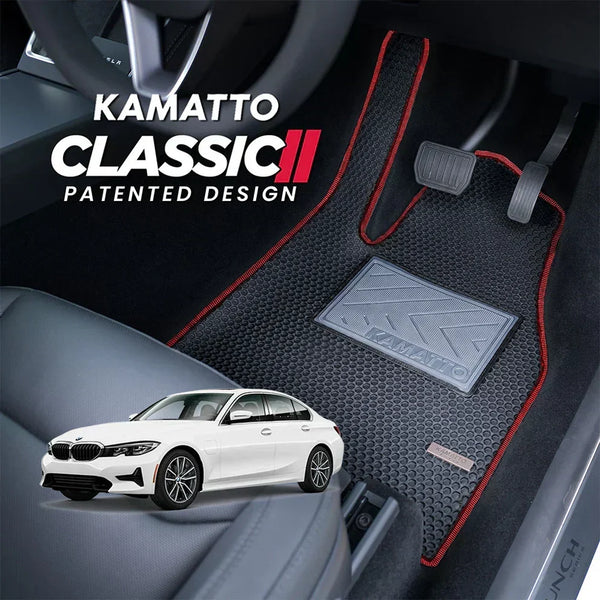Car floor mat with Kamatto Classic II branding and a white car in the background.
