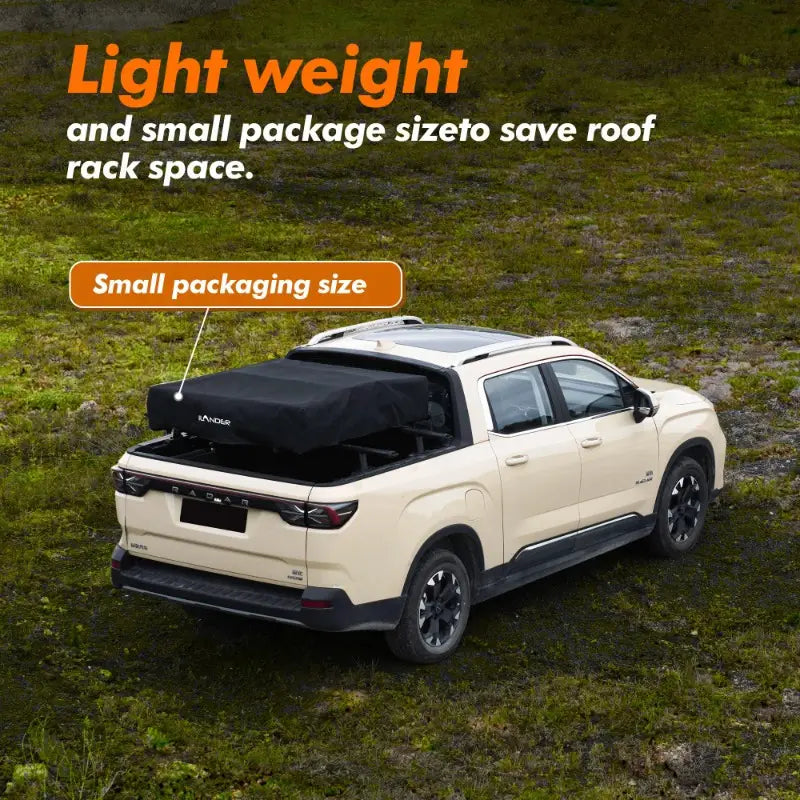 Car with a roof rack cover on a grassy background, emphasizing lightweight and small package size.